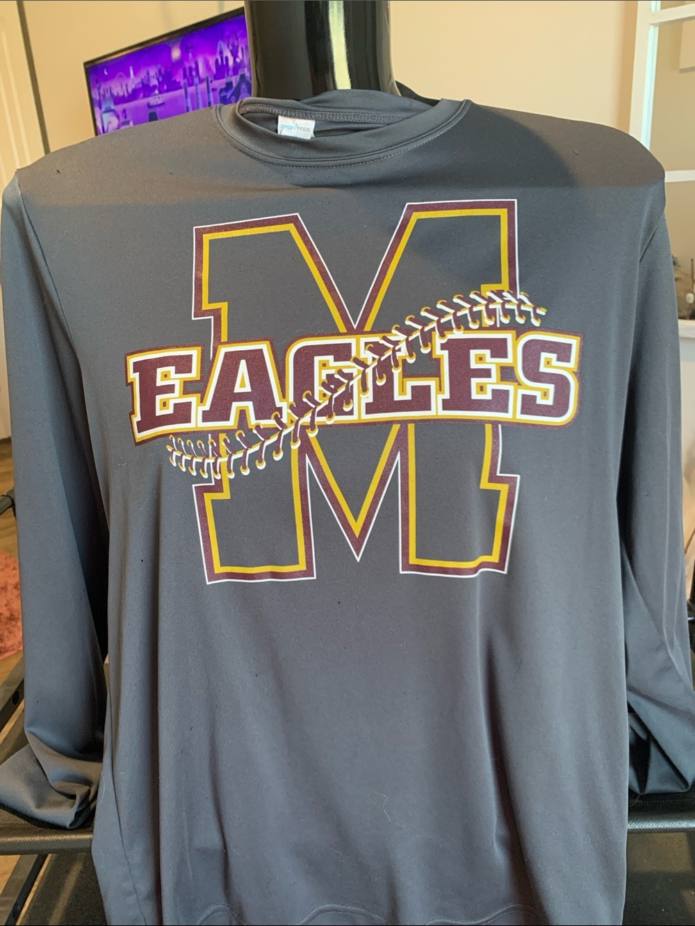 #6 Sport-Tek Black Long-Sleeve Eagles 'M' Performance Shirt with Gold Accent
